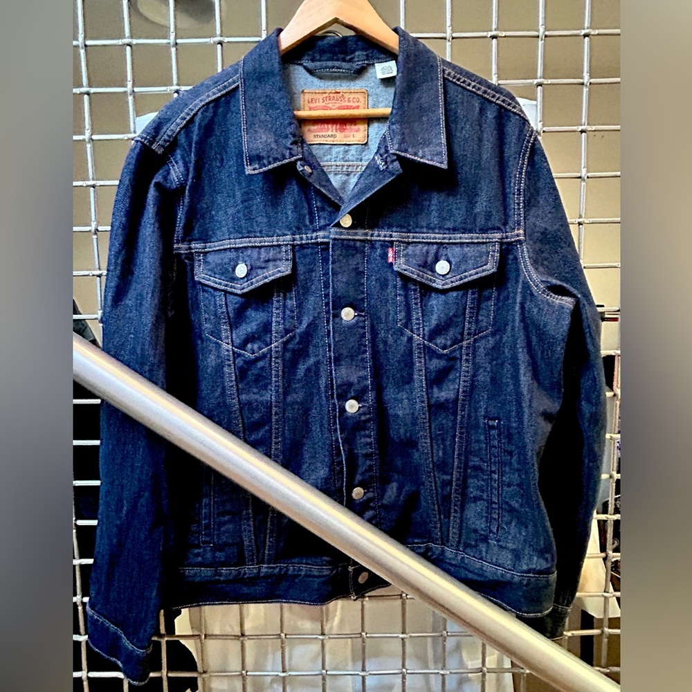Levi’s Trucker Jacket NWOT, dark wash denim jacket.